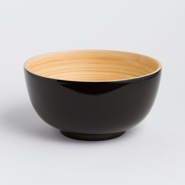 Large handcrafted bamboo salad bowl with natural bamboo grain and a spacious shape.