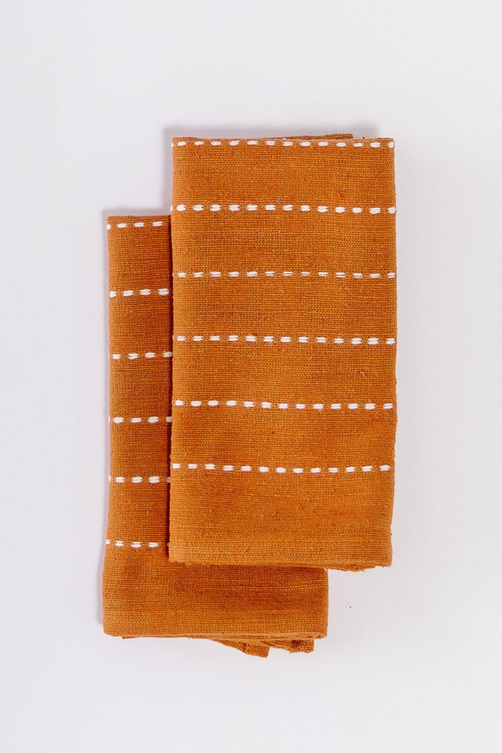 Pair of copper handwoven cotton cocktail napkins, folded