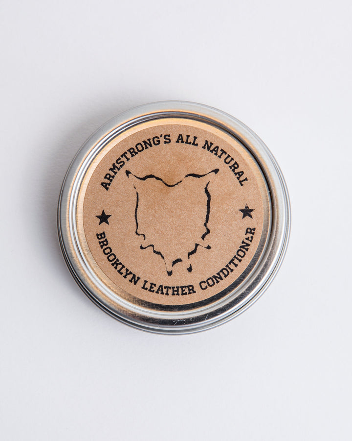 Brooklyn Leather Conditioner in a tin, an organic leather conditioner.