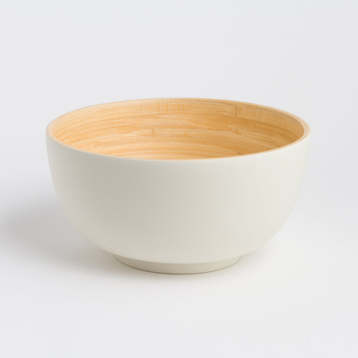 Large handcrafted bamboo salad bowl with a smooth finish and spacious interior.
