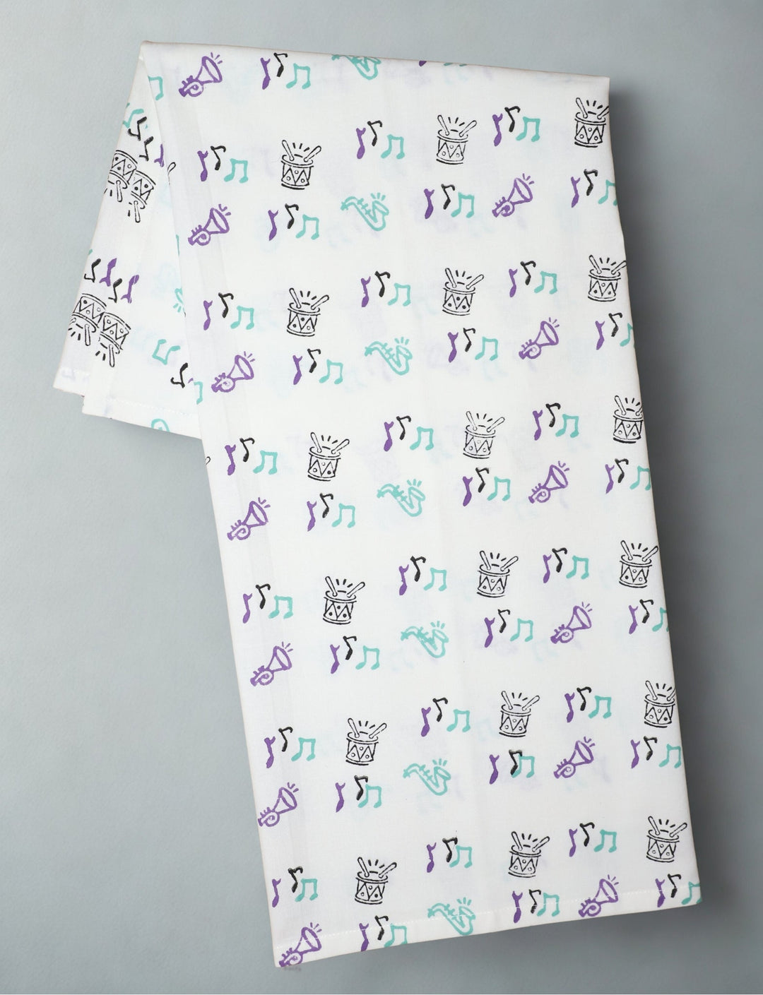Second Line cotton tea towel, hand block printed in purple and teal.