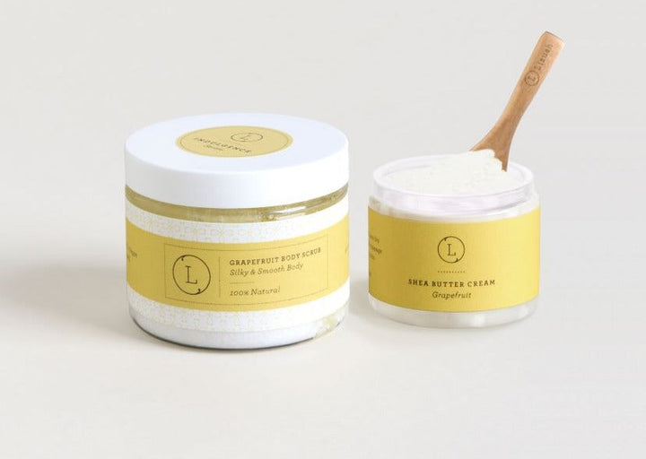 Lizush grapefruit and shea butter body care set with a body cream and exfoliating scrub.