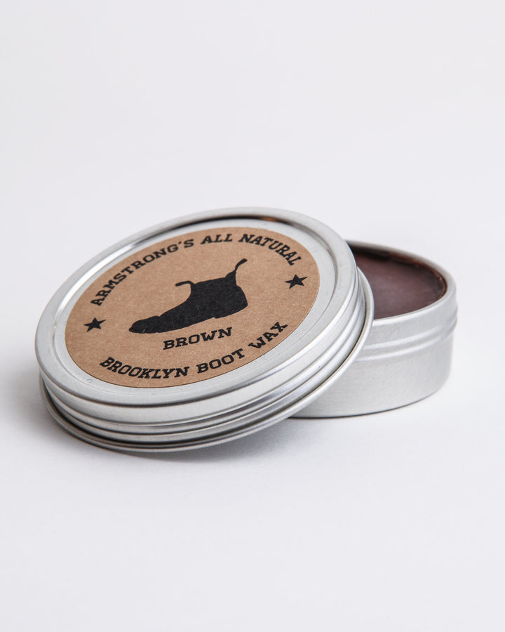 Brooklyn Boot Wax in pigmented black, showing the tin and wax texture.