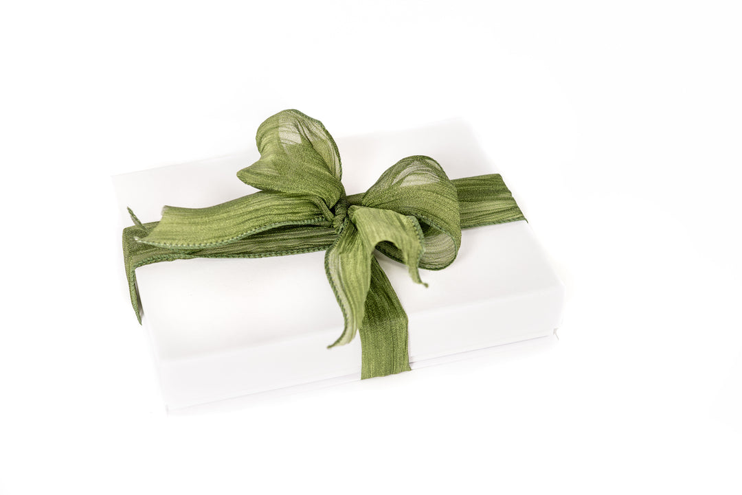 Good Skin Day gift box showing skincare products in elegant packaging.