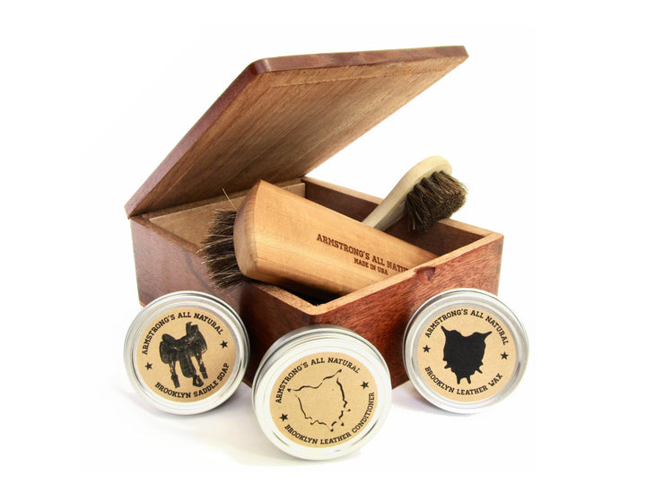 Cigar Box Shoe Shine Kit with brushes, wax, and cloth in a reclaimed cigar box.