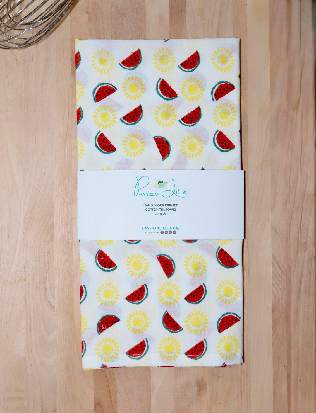 Watermelon and sun cotton tea towel, hand block printed in yellow and red.