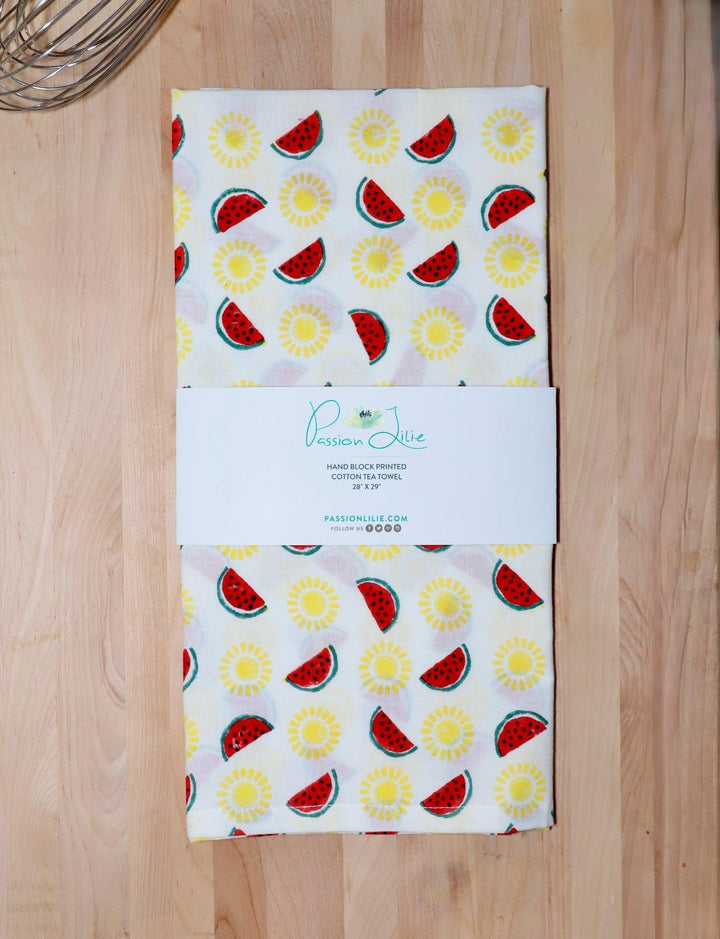 Watermelon and sun cotton tea towel, hand block printed in yellow and red.