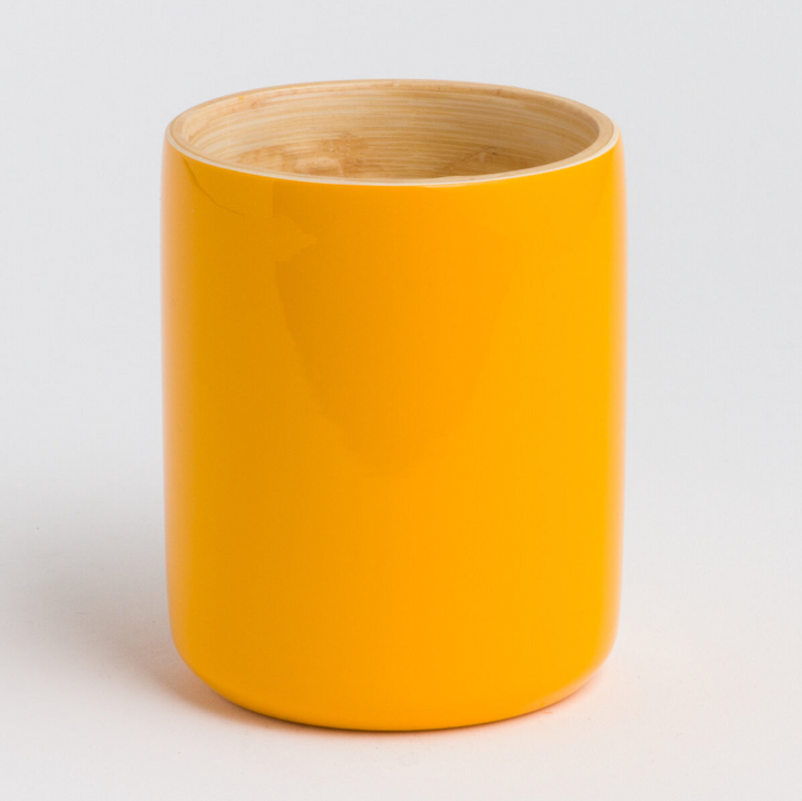 Ly bamboo mug with a smooth bamboo surface and handle, for hot drinks.