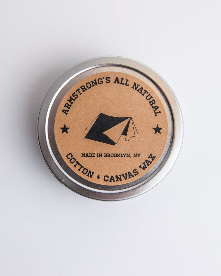 Cotton canvas wax for natural waterproofing, shown applied to fabric for protection.