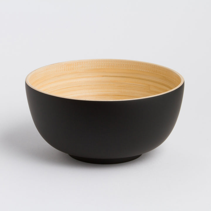 Large handcrafted bamboo salad bowl with a smooth natural finish.